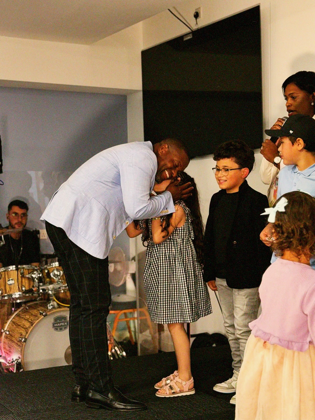 Children receiving prayer at AGGF UK